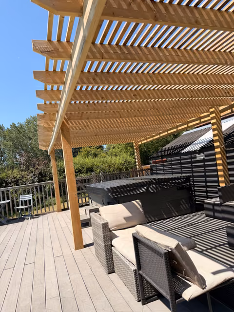 Timber pergola with contemporary slatted battens across the roof for shade at a Bitton property