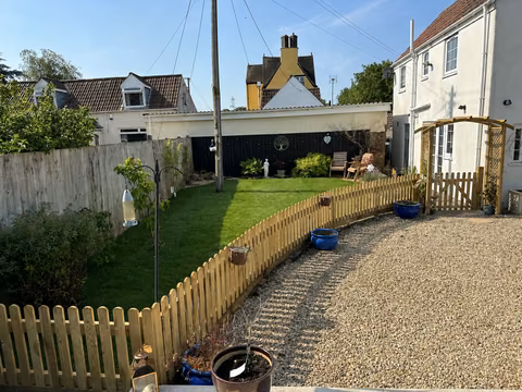 Landscaped Bristol garden with new picket fencing, lawn and gravel