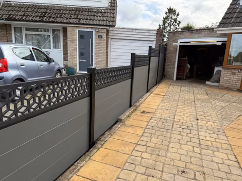 Entrance view of the Stockwood composite boundary with aluminium posts
